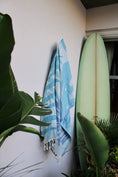 Load image into Gallery viewer, Jenn Griffith 'Ocean Hues' Towel Hanging Up